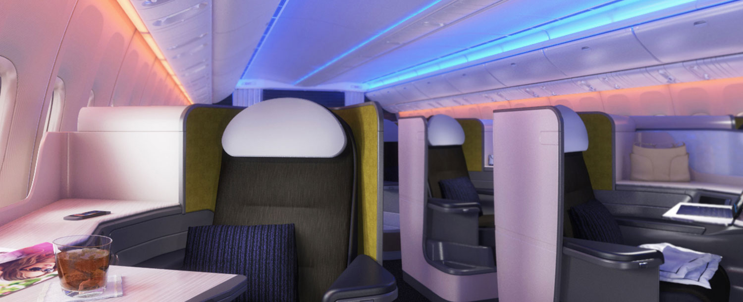 Softly lit first class seating in 777 plane