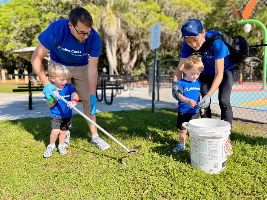 A Boeing Jacksonville, Florida employee and his family help clean up Hanna Park for Earth Day 2025.