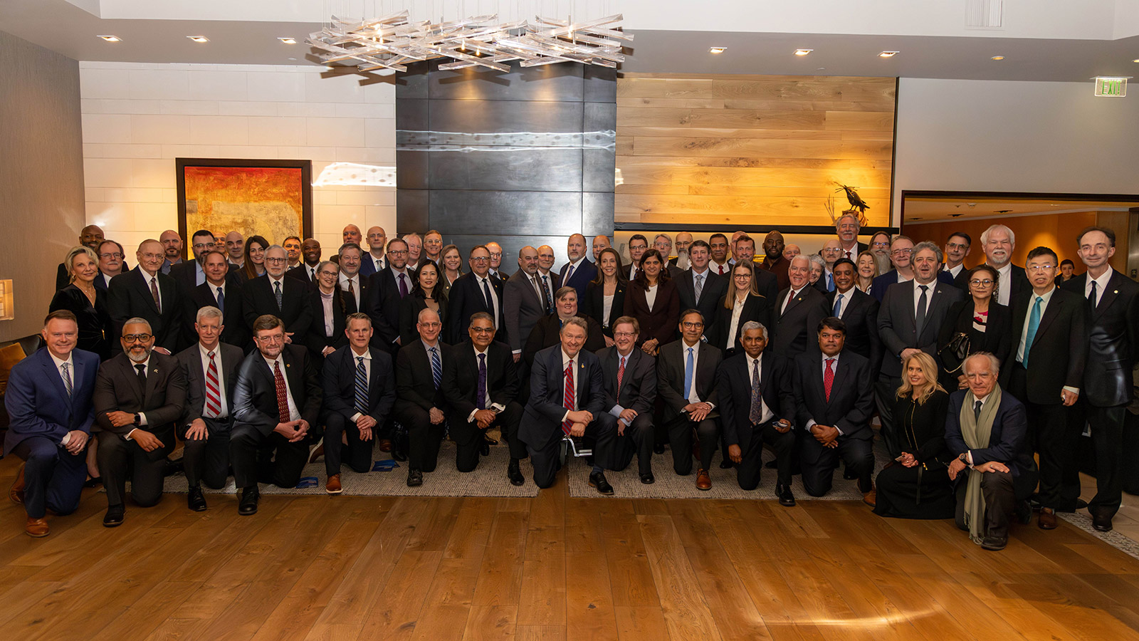 large group of engineers in elegant ballroom