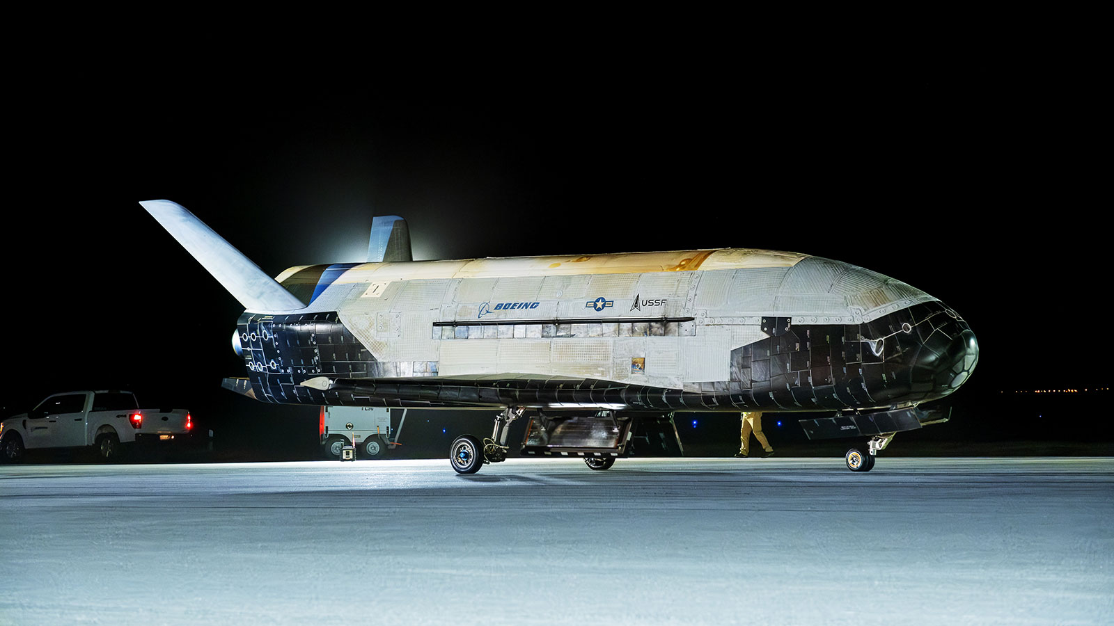 The Boeing-built X-37B lands at Vandenberg Space Force Base, California, completing its seventh mission, on March 7, 2025.