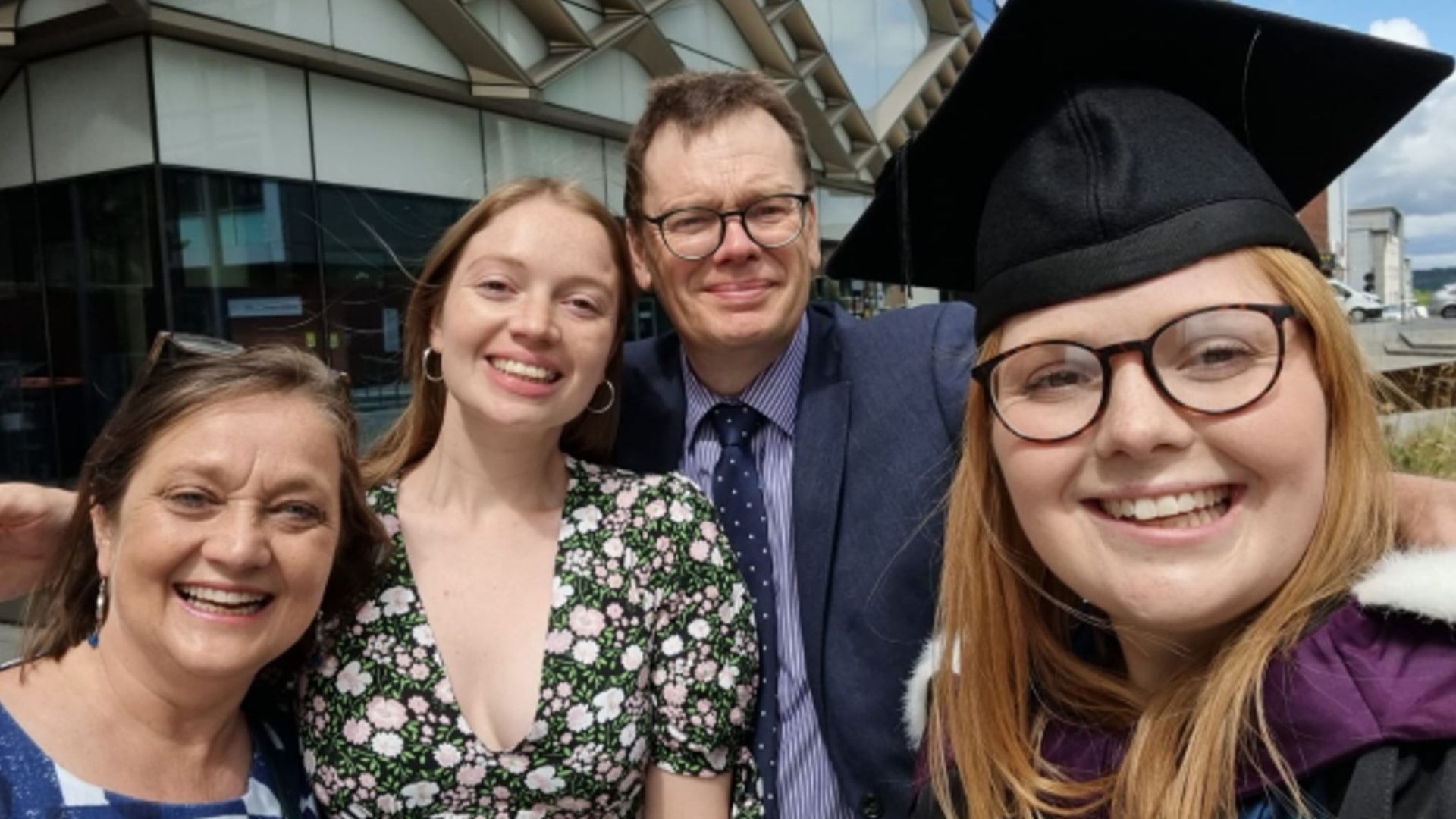 Maisie Dobbs (right) with her parents and sister after university graduation.